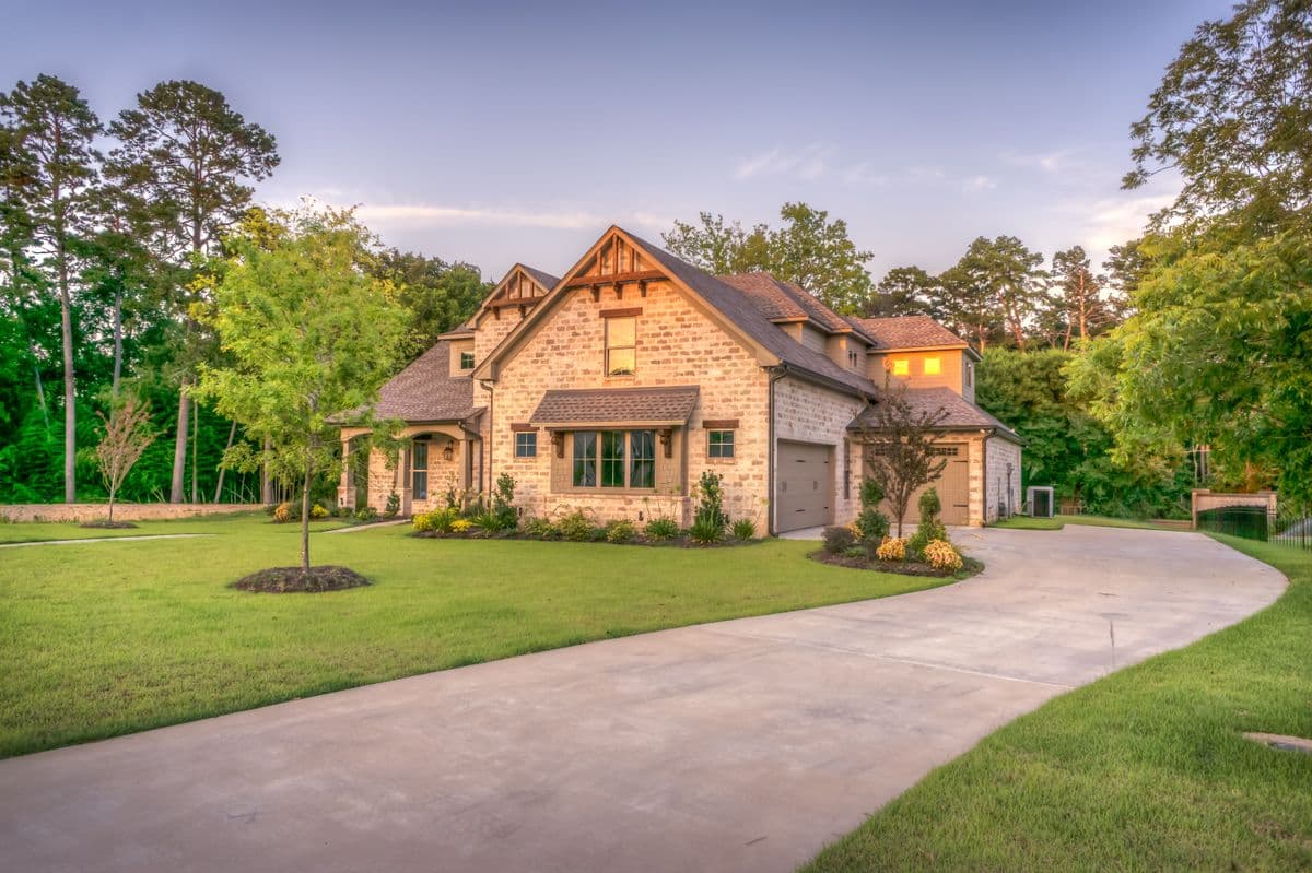 Two-story Florida home with fresh exterior paint and new impact shutters